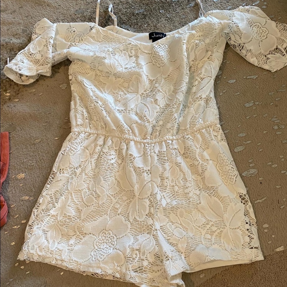 A white off the shoulder romper